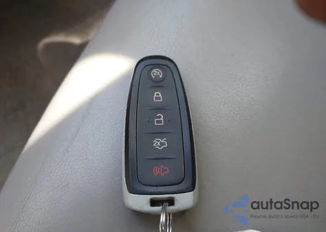 2014 Ford Escape Titanium z USA, uszkodzony, nr VIN 1FMCU9JX5EUD56425